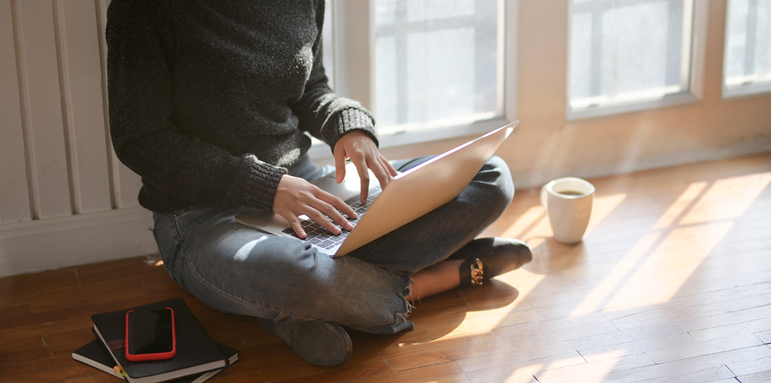 Woman typing on laptop